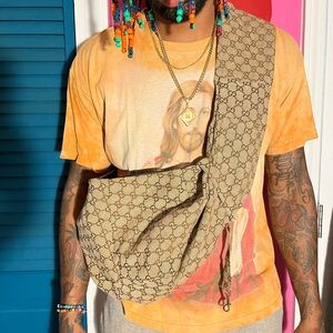 Pet sling carrier with cell phone pocket